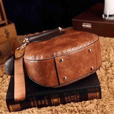 Kristina | Elegantna usnjena torbica z dolgim trakom