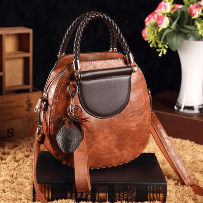 Kristina | Elegantna usnjena torbica z dolgim trakom